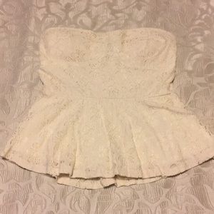 Ivory strapless peplum top